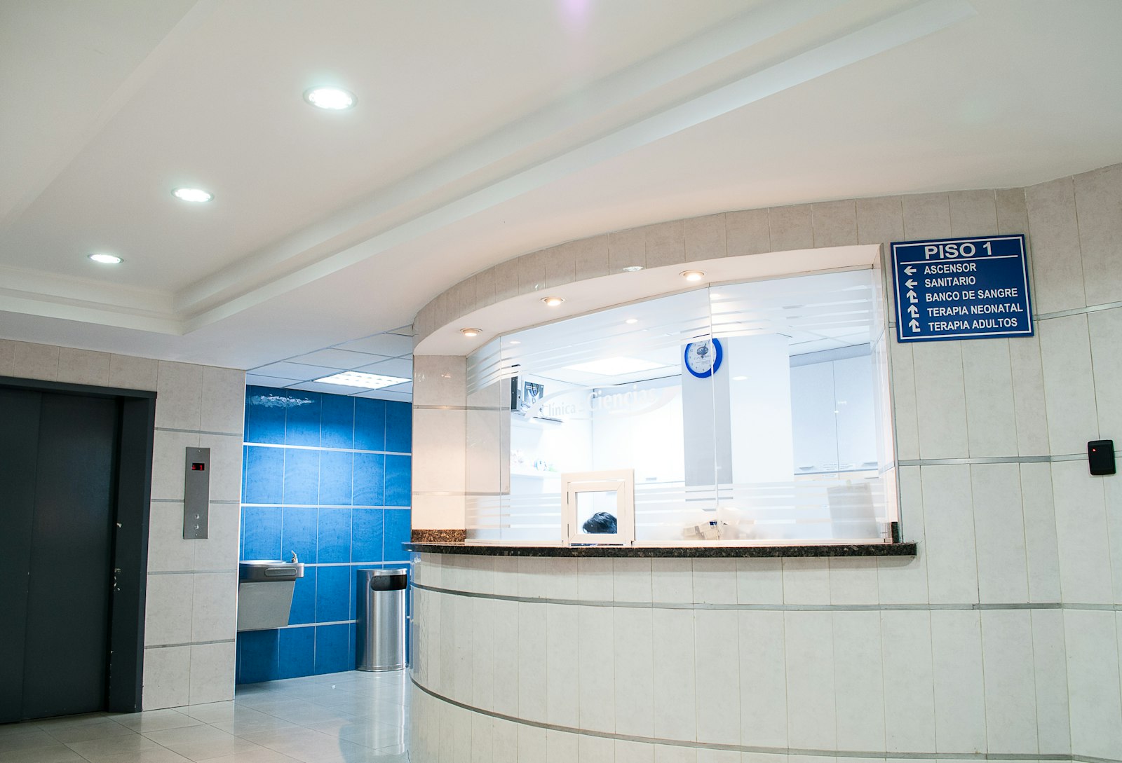 Hospital reception corridor representing digital health platforms that connect patients, doctors and labs